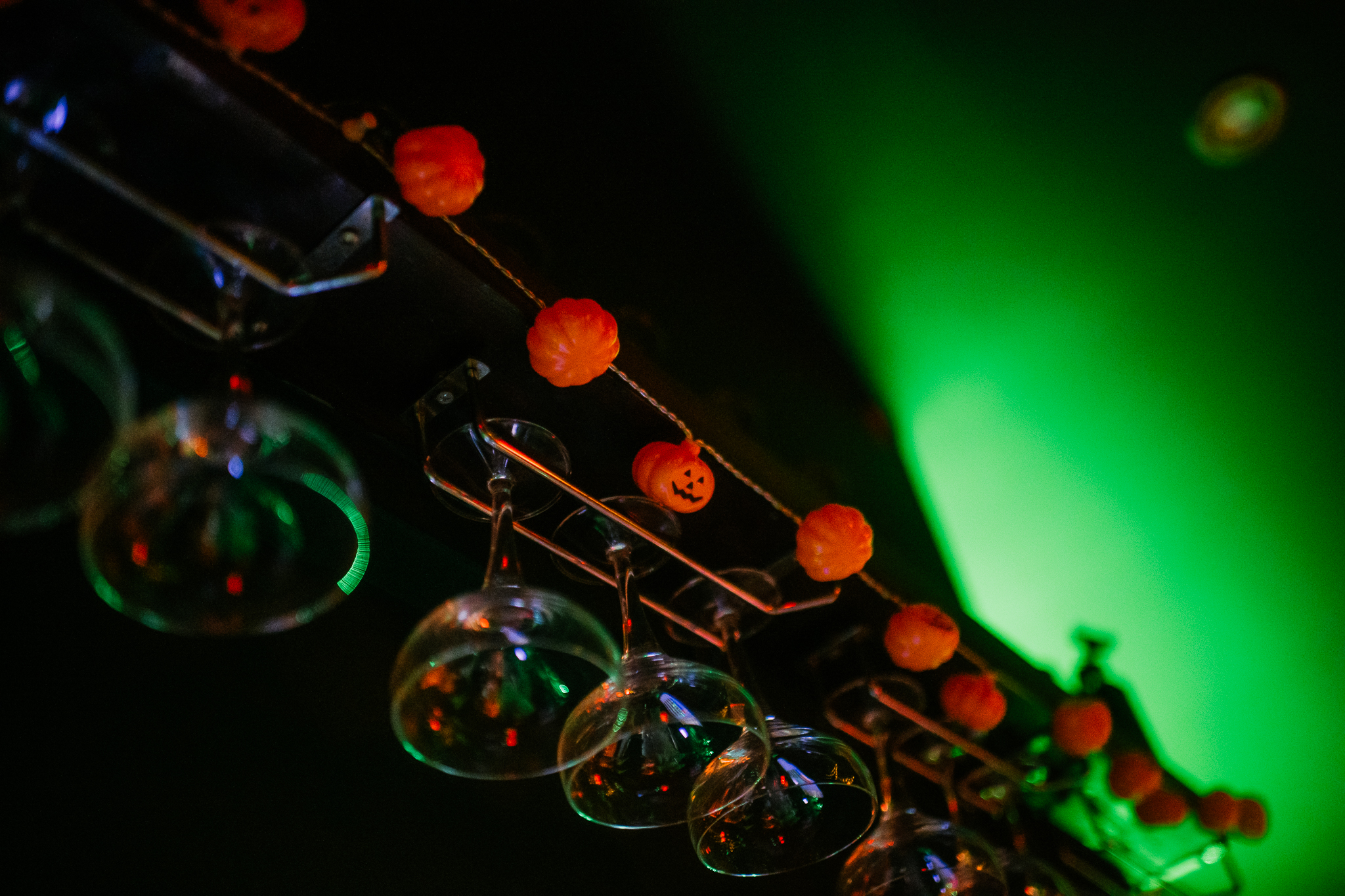 Halloween vibes at Verve in Leeds - Pumpkin lanterns hang around cocktail glasses,